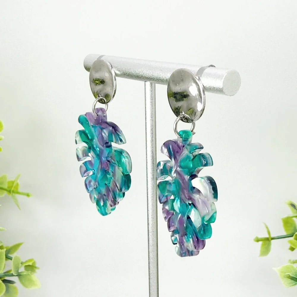 Tropical Dangles
